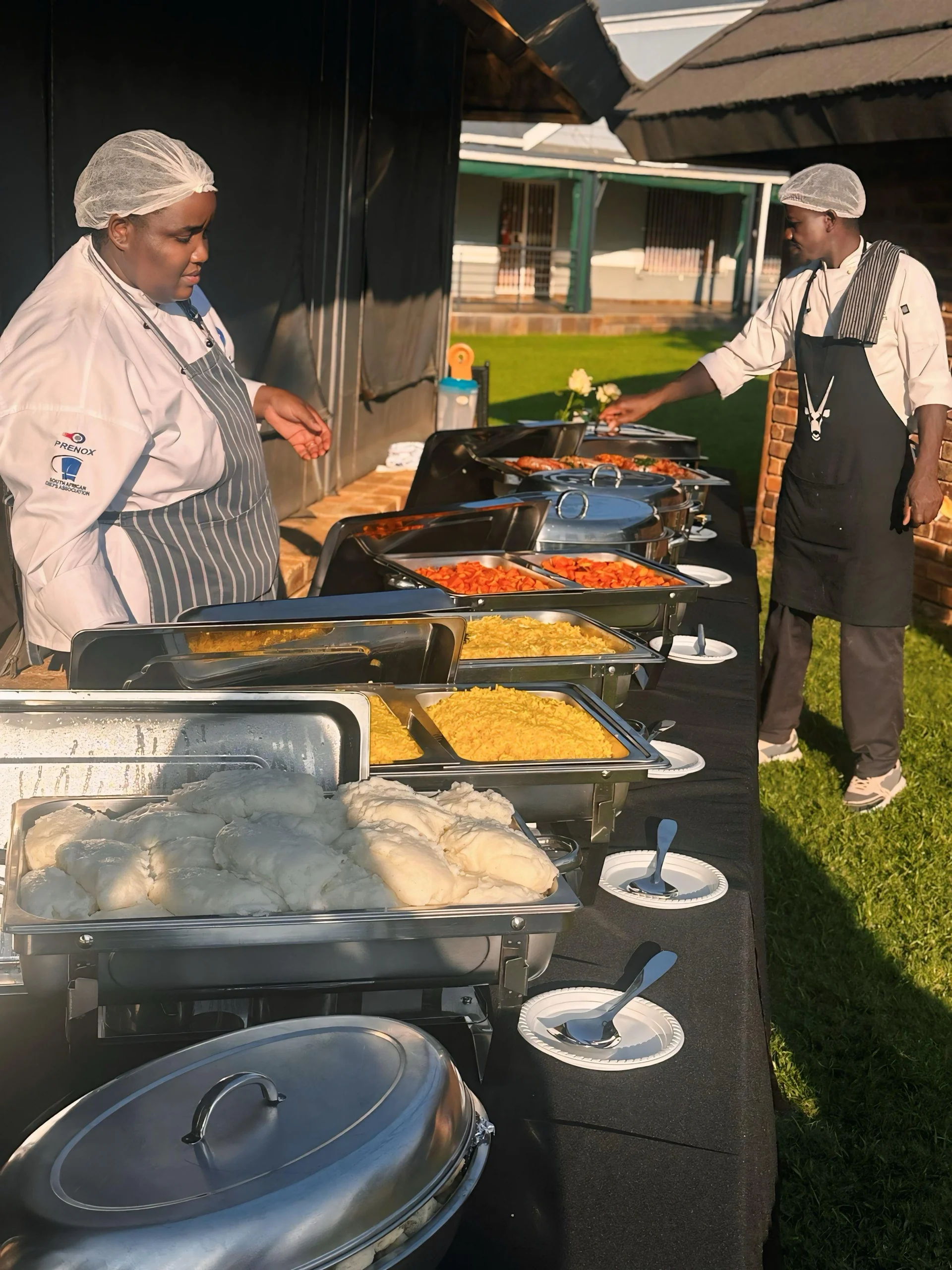 Chef plating a gourmet dish in the kitchen